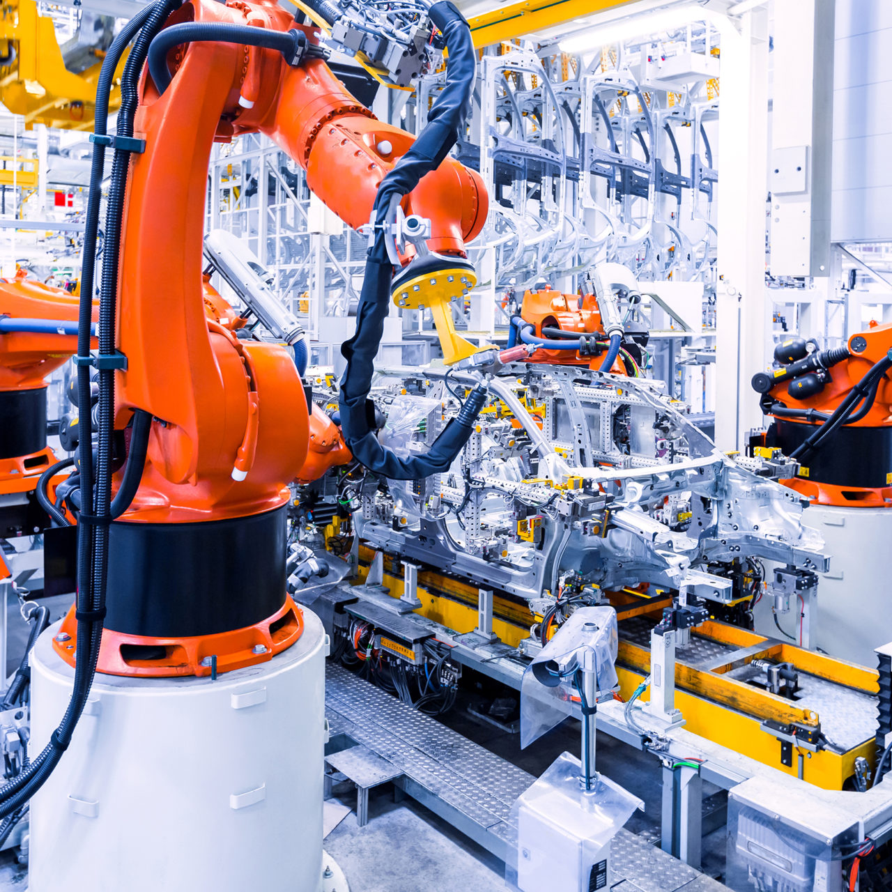 Mlada Boleslav, Czech Republic - May 30, 2015: Skoda Auto celebrates 120 years since its establishemnt by Open Doors Day. Welding robots show visitors slow operating of car manufacturing.
